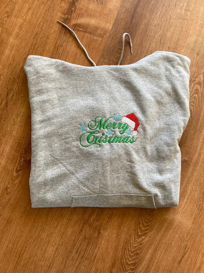 Merry Christmas Embroidered Hoodie Featuring a Santa Hat Design